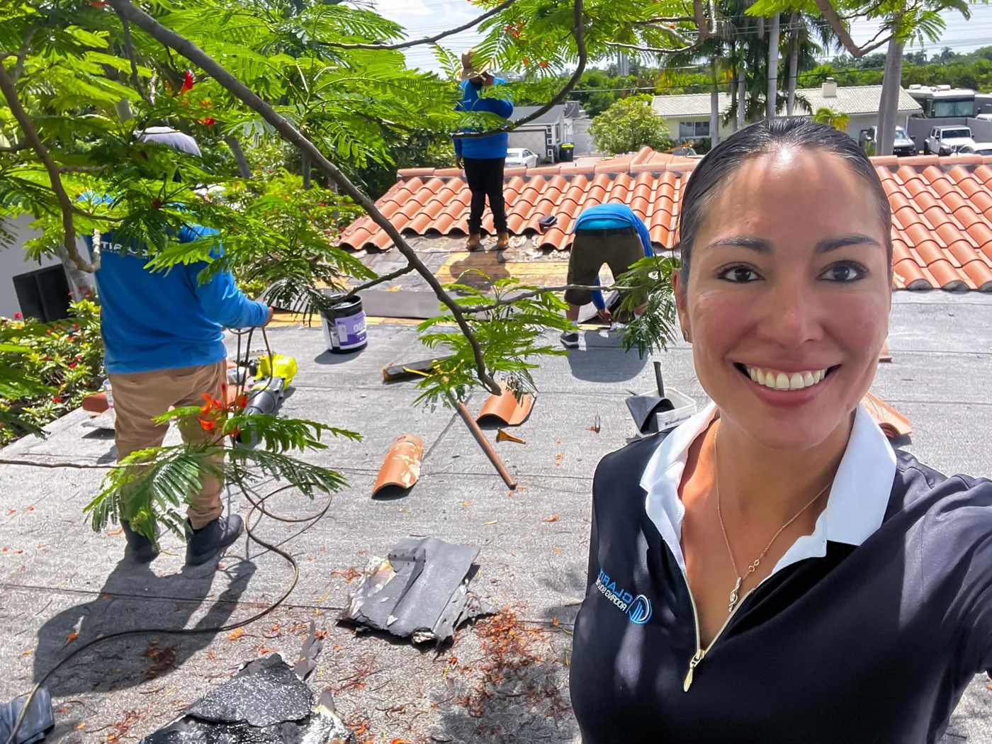 Clarity Roofing emergency tarp installation protecting a South Florida roof after storm damage