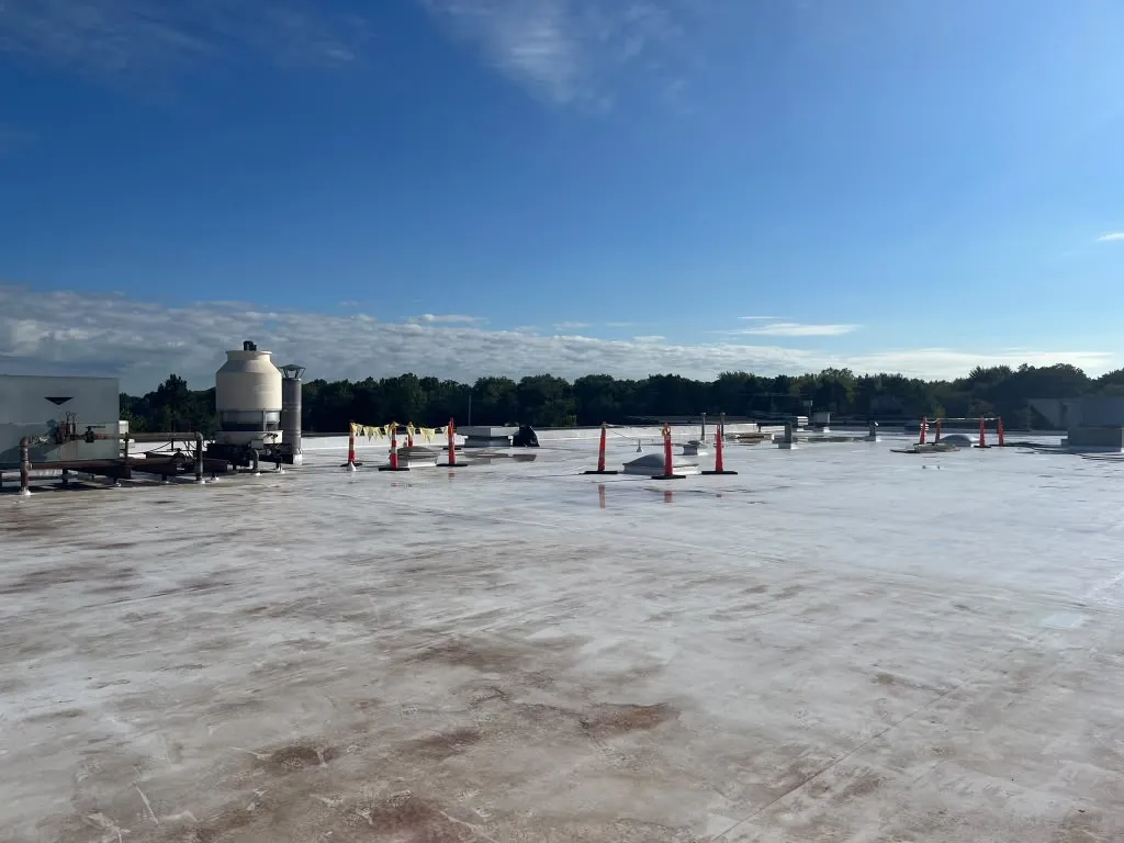 Flat commercial roof after coating application